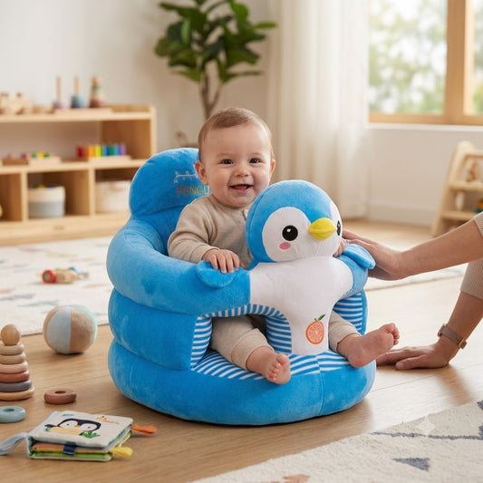 Plush infant floor support seat with high backrest and wrap-around armrests, penguin (blue) and cat (pink) character designs with striped inner panels and embroidery