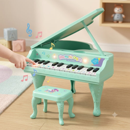 Mint green kids electronic toy grand piano/organ with unicorn graphics, numbered keys and matching stool
